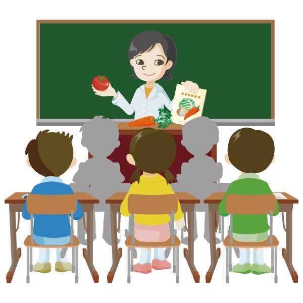 黒板がある教室で座っている子どもたちに対して、白衣を着て野菜について説明する栄養教諭