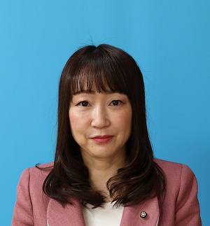 石井副議長の写真。背景はブルー。