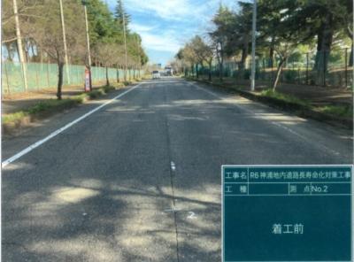 工事着工前（市道0114号線）わだちやクラックが発生し、センターラインが消えかかっている状態です。