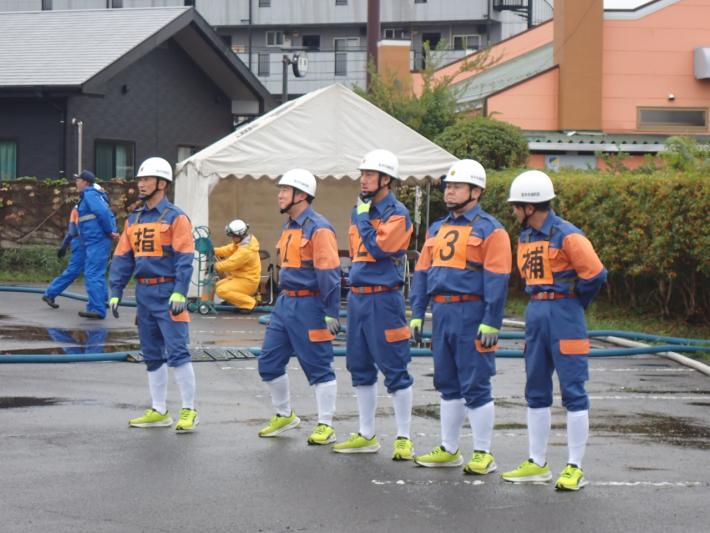 18分団が競技開始前に待機している様子